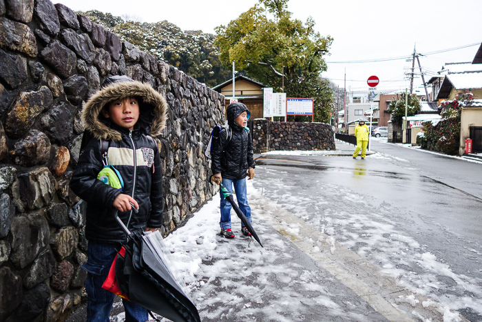 Kids are playing in snow